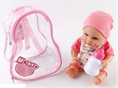 Малка музикална кукла бебе в раничка с шише