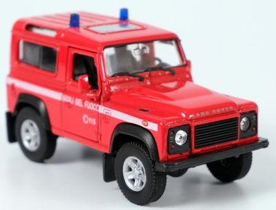 Металeн автомобил с отварящи се врати Land Rover Defender Fire -1:34 Welly 