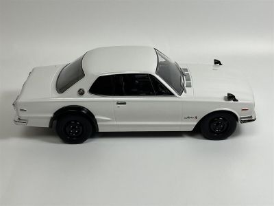 Метален автомобил Nissan Skyline GT-R KPGC10 Triple9 Collection 1:18 - T91800181